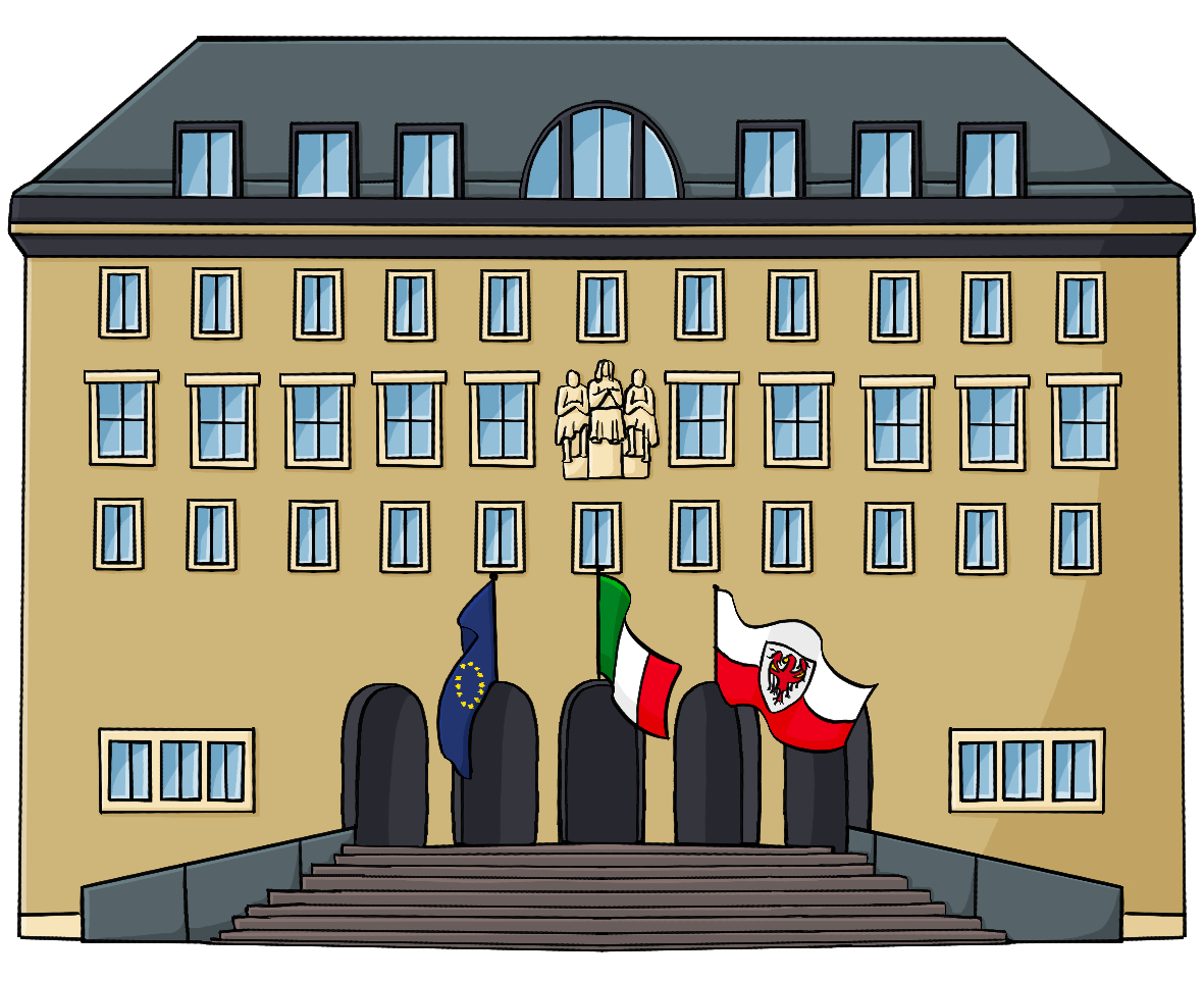 Ein großes gelbes Gebäude. Vor dem Eingang wehen die Fahnen von Europa, Italien und Südtirol.