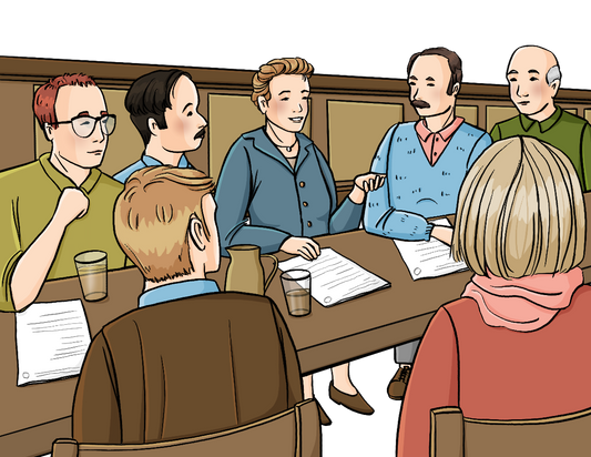 Zwei Frauen und 5 Männer sitzen an einem Tisch, auf dem Tisch sind Papiere und Biergläser.
