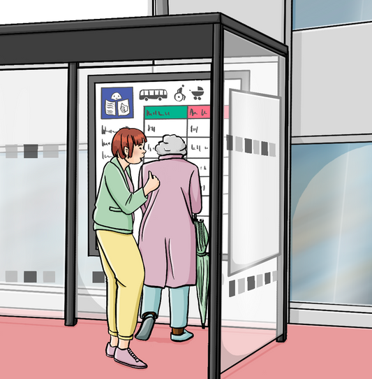 Zwei Frauen schauen auf die Fahrpläne an einem Haltestellenhäuschen. Auf dem Fahrplan ist das Symbol für Leichte Sprache.