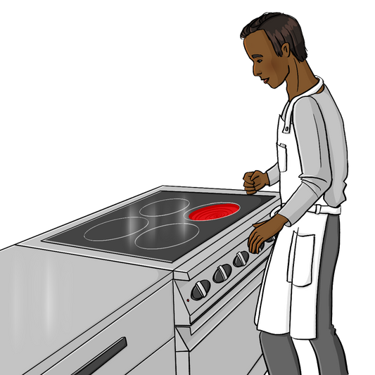 Ein Mann mit einer Schürze steht vor einem Herd mit Ceranfeld. Eine Herdplatte leuchtet rot.