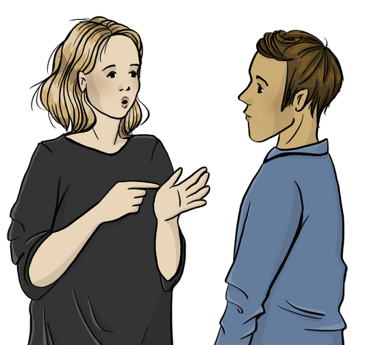 Ein Mann und eine Frau stehen sich gegenüber. Die Frau zeigt mit dem rechten Zeigefinger auf die linke Hand und formt mit dem Mund ein o. 