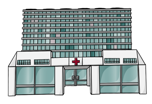 Ein großes Gebäude mit vielen Fenstern. Über dem Eingang ist ein Schild mit einem roten Kreuz.