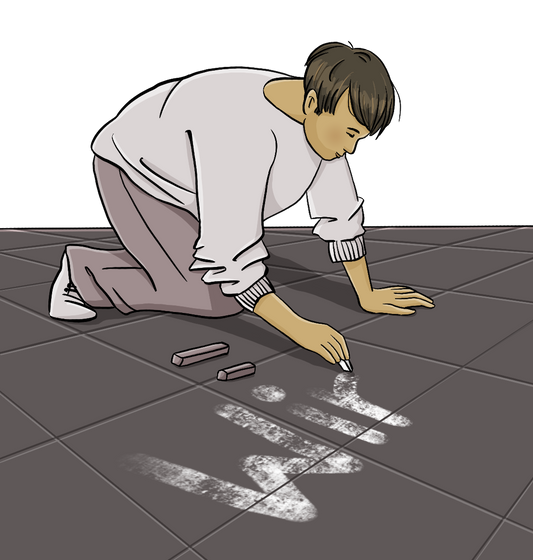 Eine Person schreibt mit Kreide das Wort: Wir. auf den Boden.