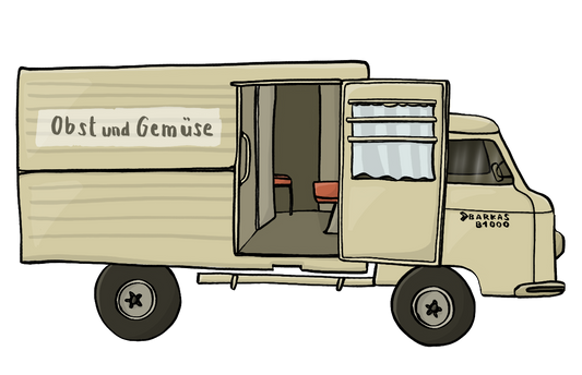 Ein brauner Barkas-Lastwagen aus DDR-Zeiten mit der Aufschrift Obst und Gemüse. Die Tür ist geöffnet. Im Inneren sind Stühle, das Türfenster ist mit einem Vorhang verhängt.