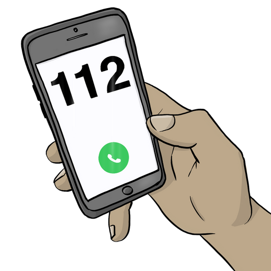 Eine Hand hält ein Smartphone. Auf dem Bildschirm ist die Nummer 112 und ein grüner Kreis mit einem Telefon-Hörer-Symbol.