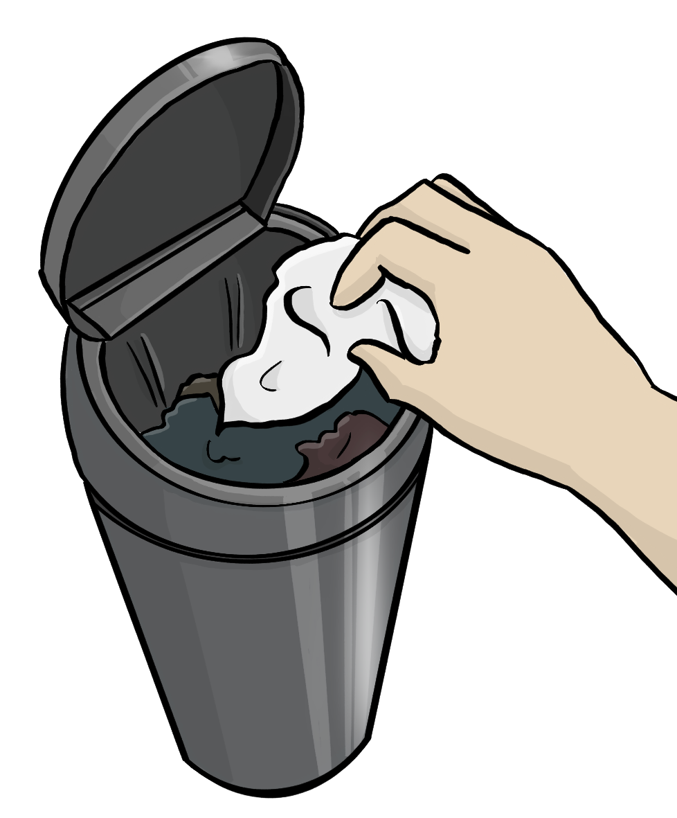 Eine Hand hält ein zerknülltes Tuch über einen geöffneten Mülleimer. 